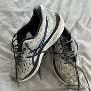 Used running shoes white. Lots of tread left